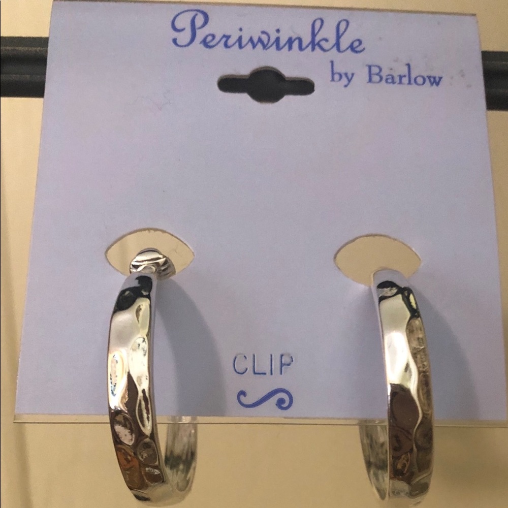 Silver tone hammered clip earrings